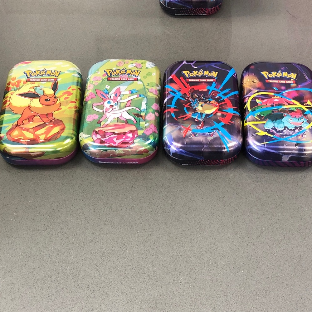 Pokemon Metal Storage Tins - Yellow, Green, Purple, Blue